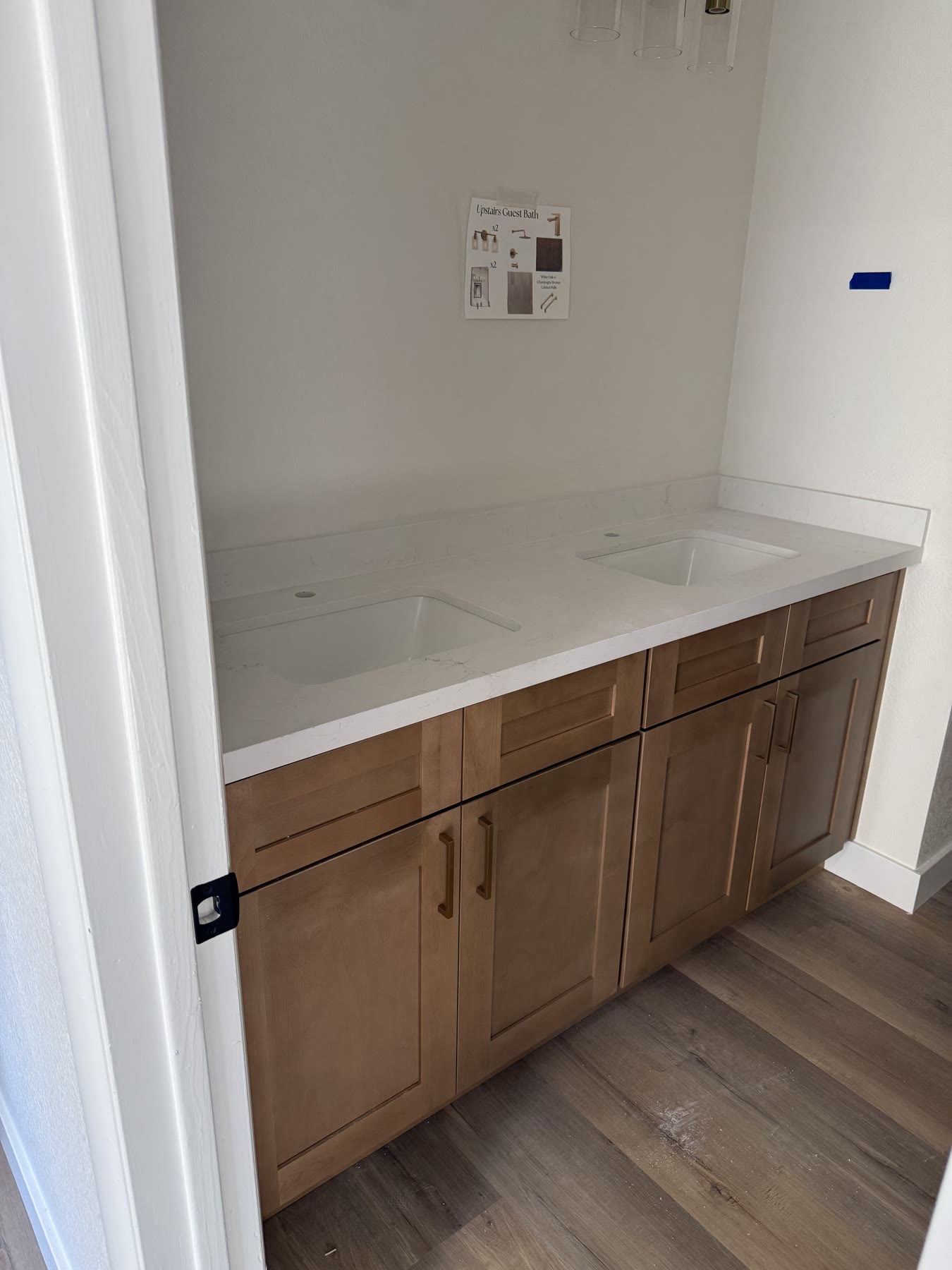 Custom natural-wood double-sink vanity crafted by the Saguaro team